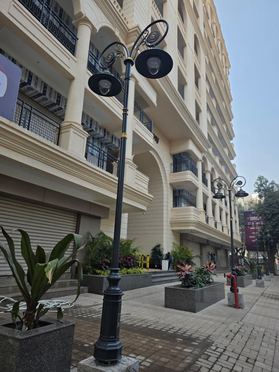 Elegant decorative poles at City Center Mall frontage Nashik at night